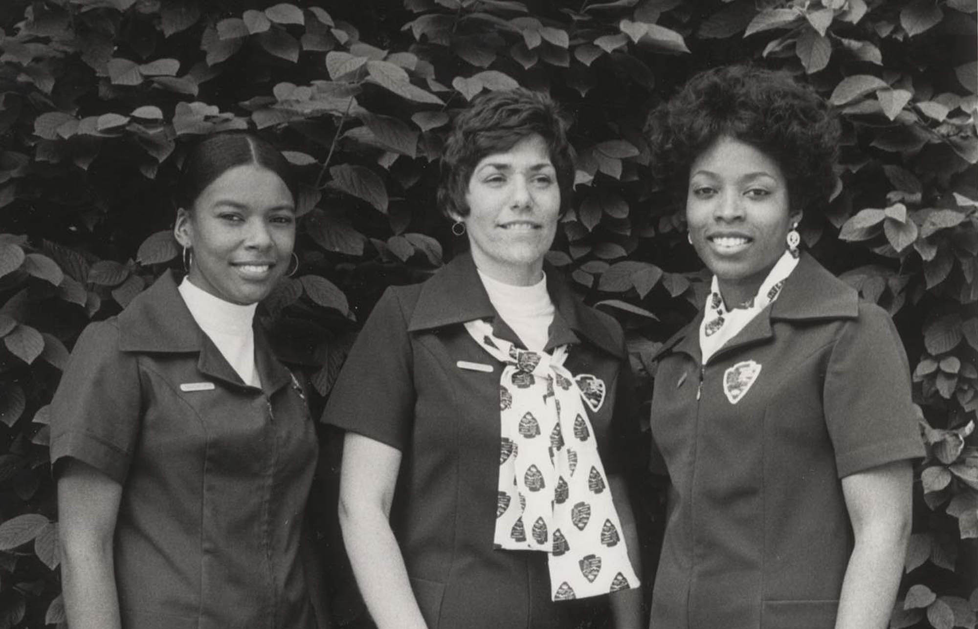 Three Women Wearing the 1974 Uniform with Arrowhead Patch